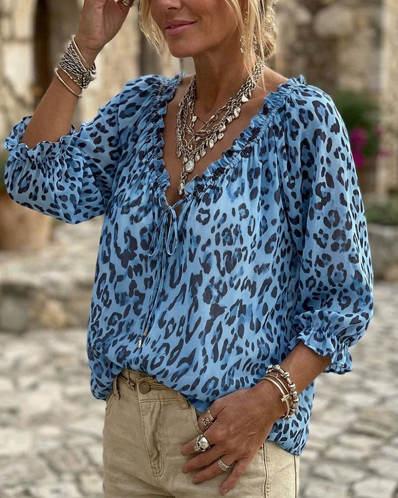 Roxiefa | Blouse léopard avec décolleté en V et lacets