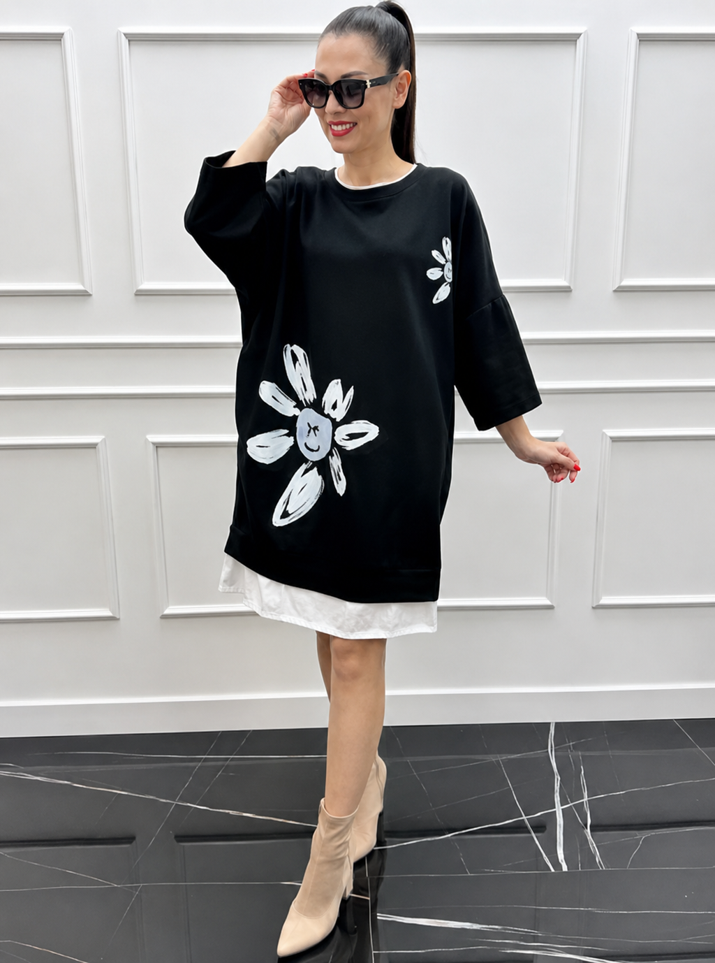 Lercka | Robe longue élégante à manches longues avec accent floral