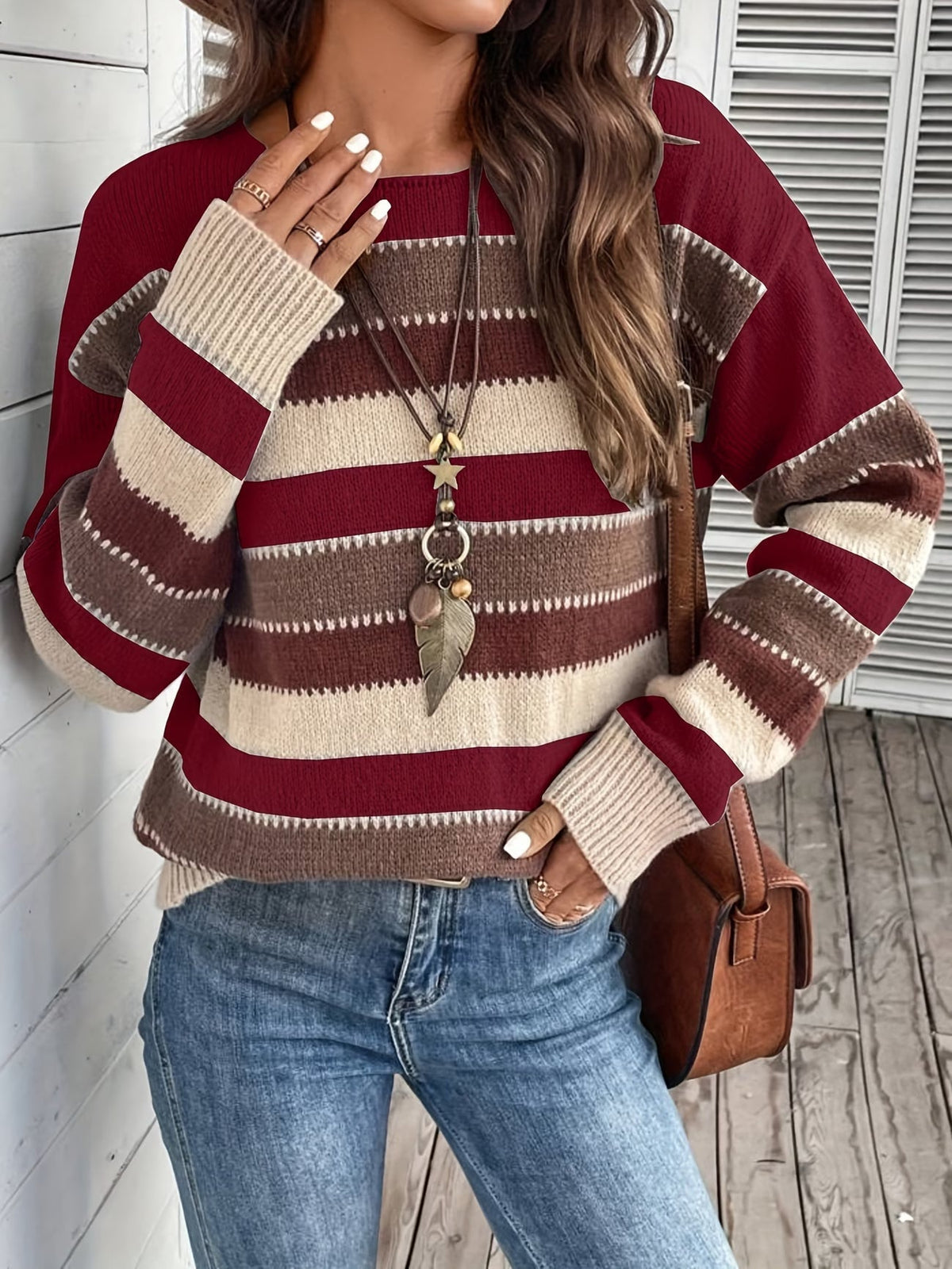 Pull femme rayé en maille à col rond