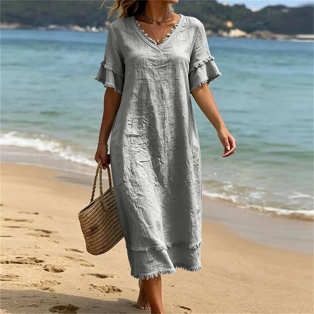 Robe femme bohème col V avec franges et coupe fluide