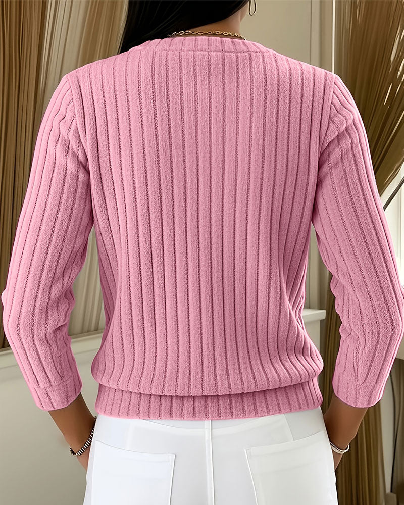 Manteau élégant à boutons et col rond
