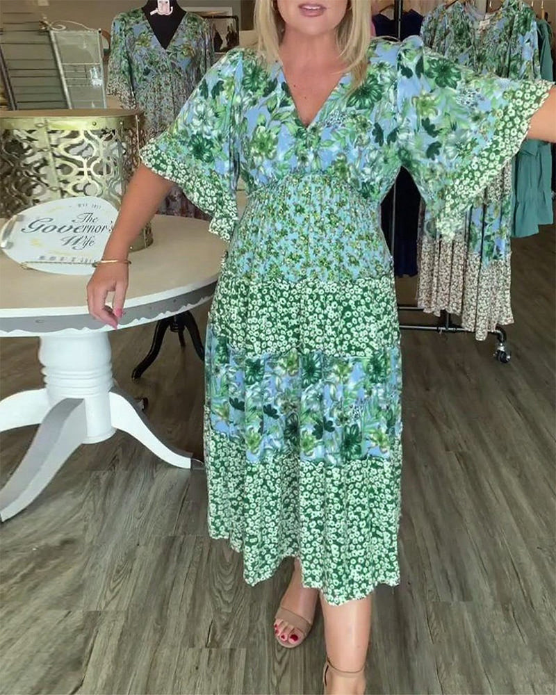 Robe Fleurie à Manches Lotus en V