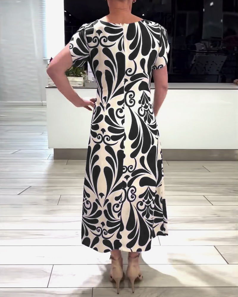 Robe élégante à imprimé contrasté à manches courtes