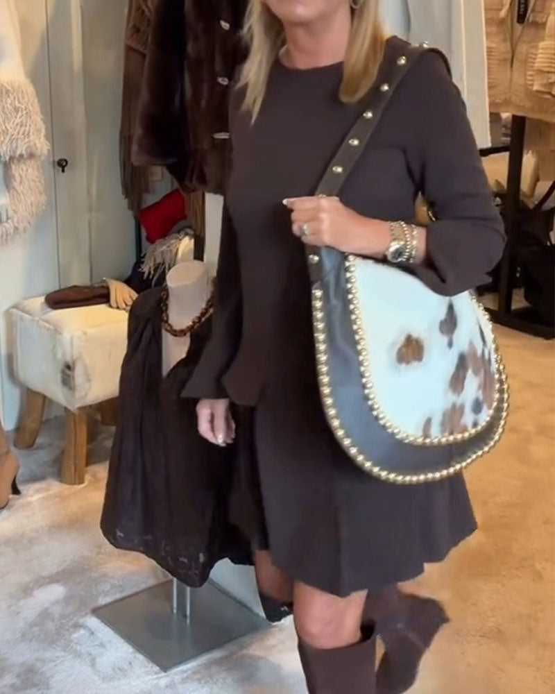Une Robe à Manches Fendues