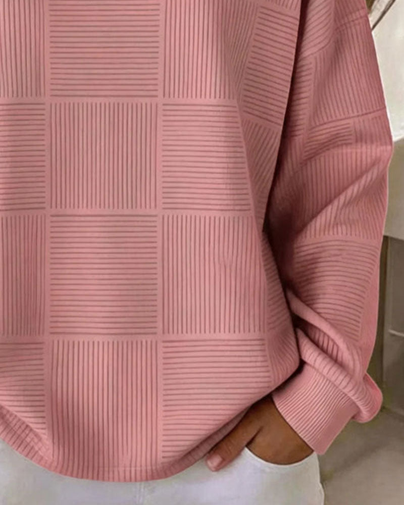 Pull-over en sweat à manches longues avec texture en grille