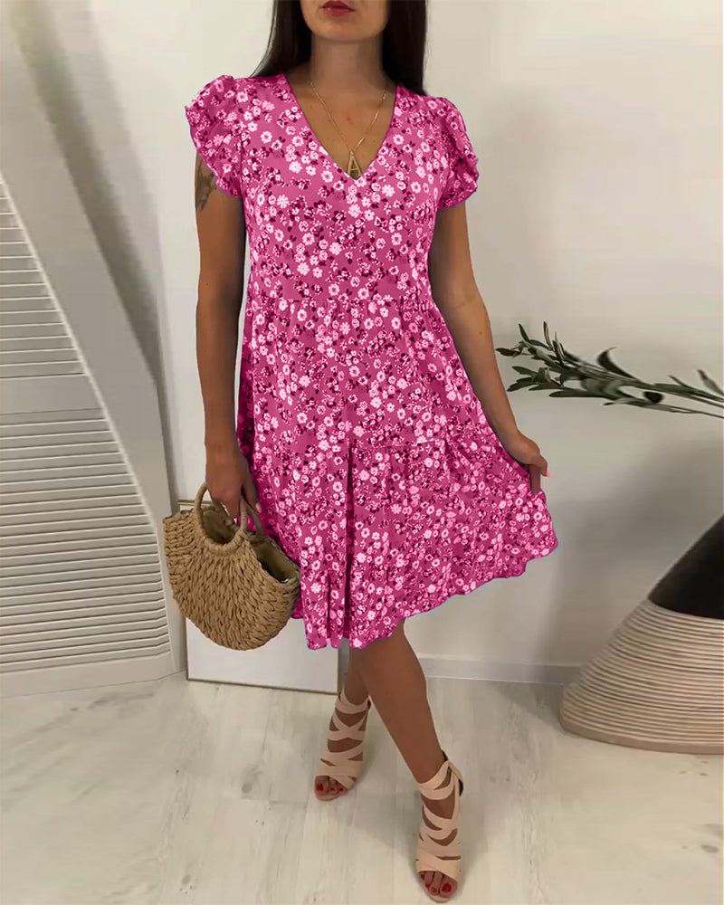 Robe midi sans manches à fleurs avec décolleté en V