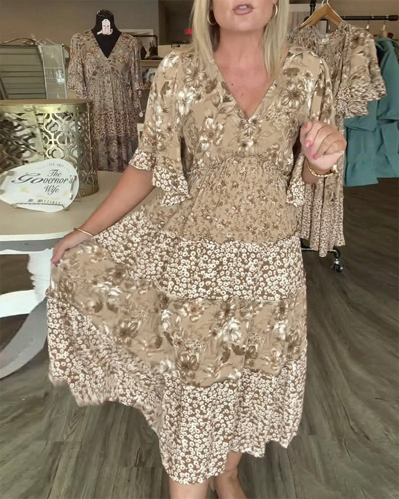 Robe Fleurie à Manches Lotus en V
