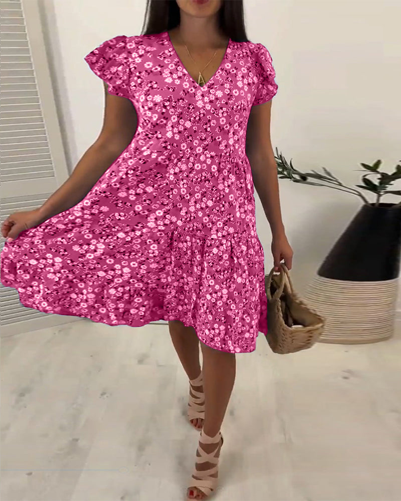 Robe midi sans manches à fleurs avec décolleté en V