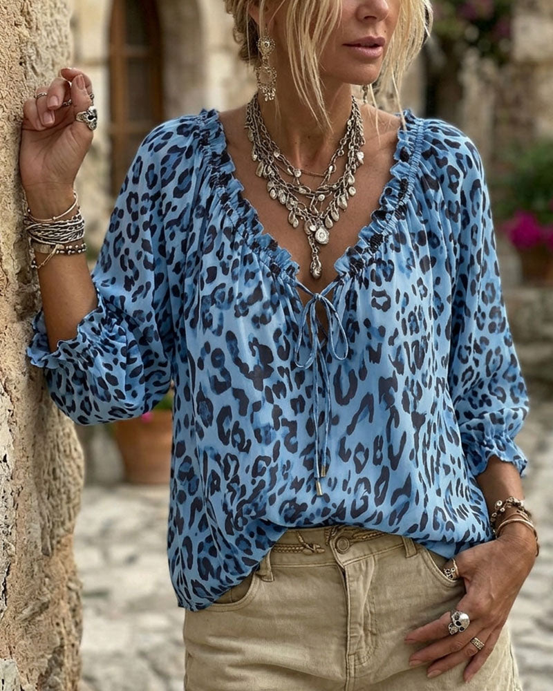 Roxiefa | Blouse léopard avec décolleté en V et lacets