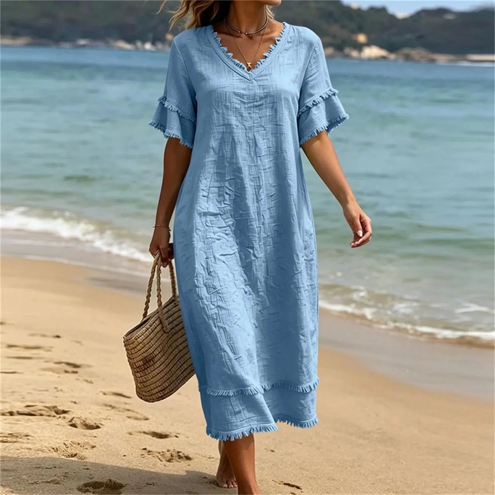 Robe femme bohème col V avec franges et coupe fluide