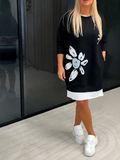 Lercka | Robe longue élégante à manches longues avec accent floral