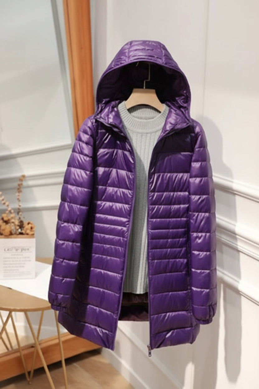 Manteau long matelassé à capuche et fermeture éclair