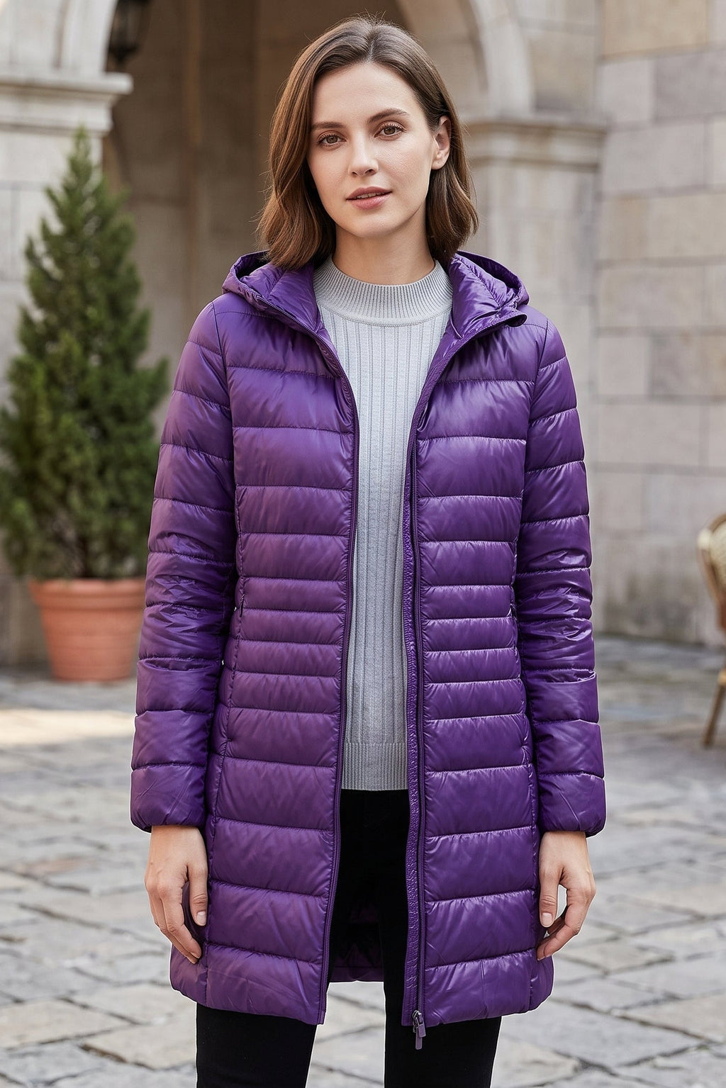 Manteau long matelassé à capuche et fermeture éclair
