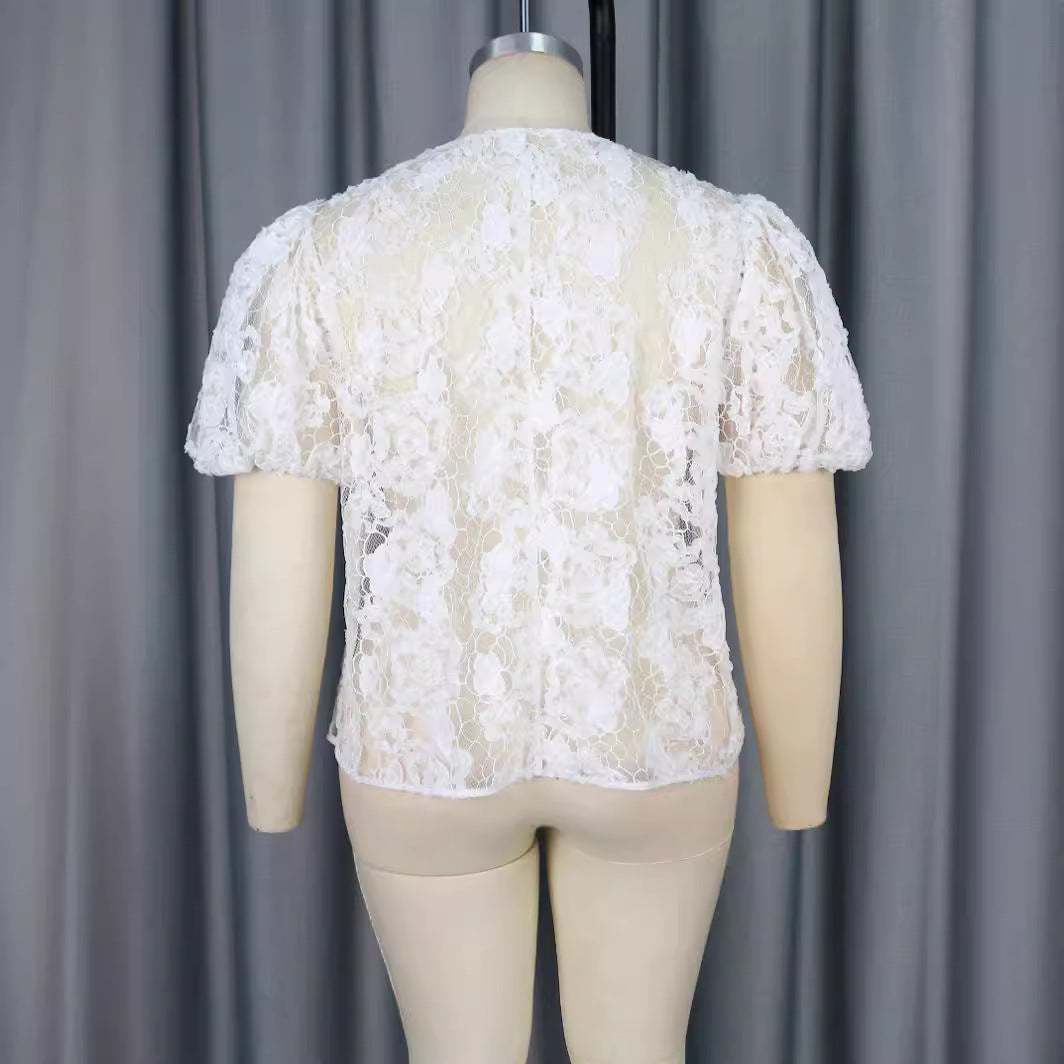Blouse en dentelle ludique avec des manches volumineuses Mirla