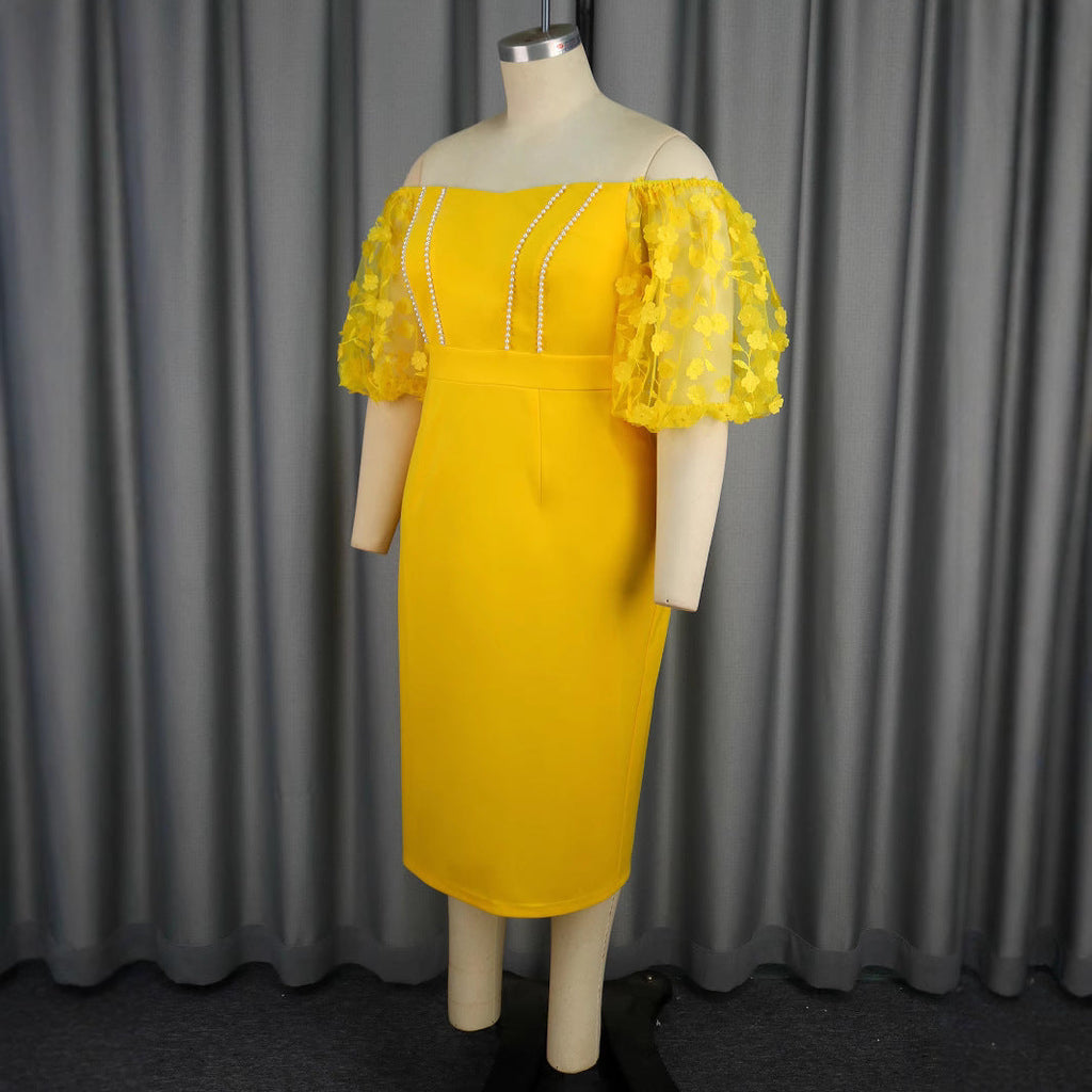 Robe ajustée pour femme avec manches bouffantes décorées et centre en perles Mirla