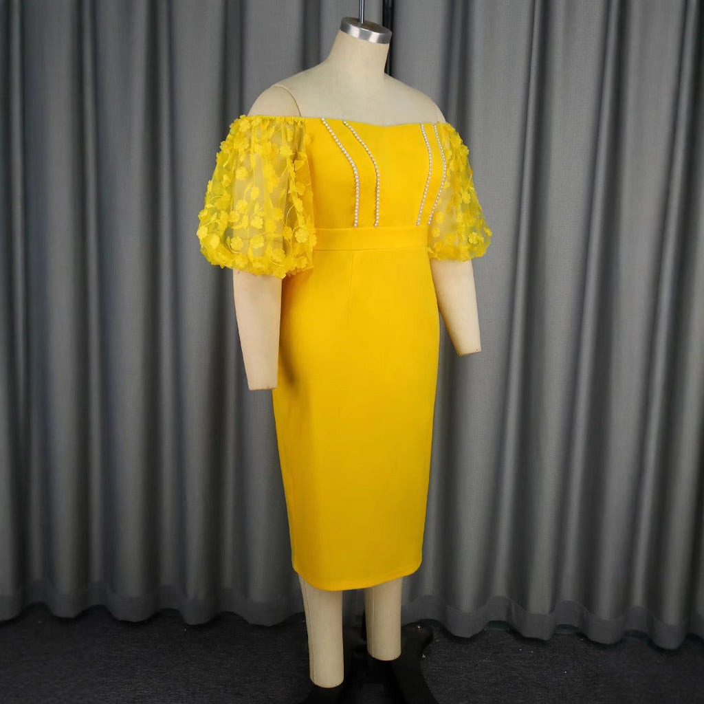 Robe ajustée pour femme avec manches bouffantes décorées et centre en perles Mirla