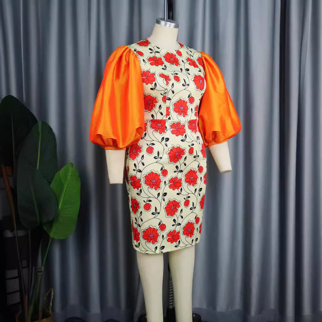 Robe ajustée pour femmes avec des manches bouffantes volumineuses et un motif floral Mirla