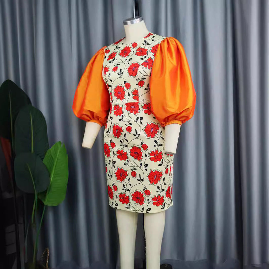 Robe ajustée pour femmes avec des manches bouffantes volumineuses et un motif floral Mirla