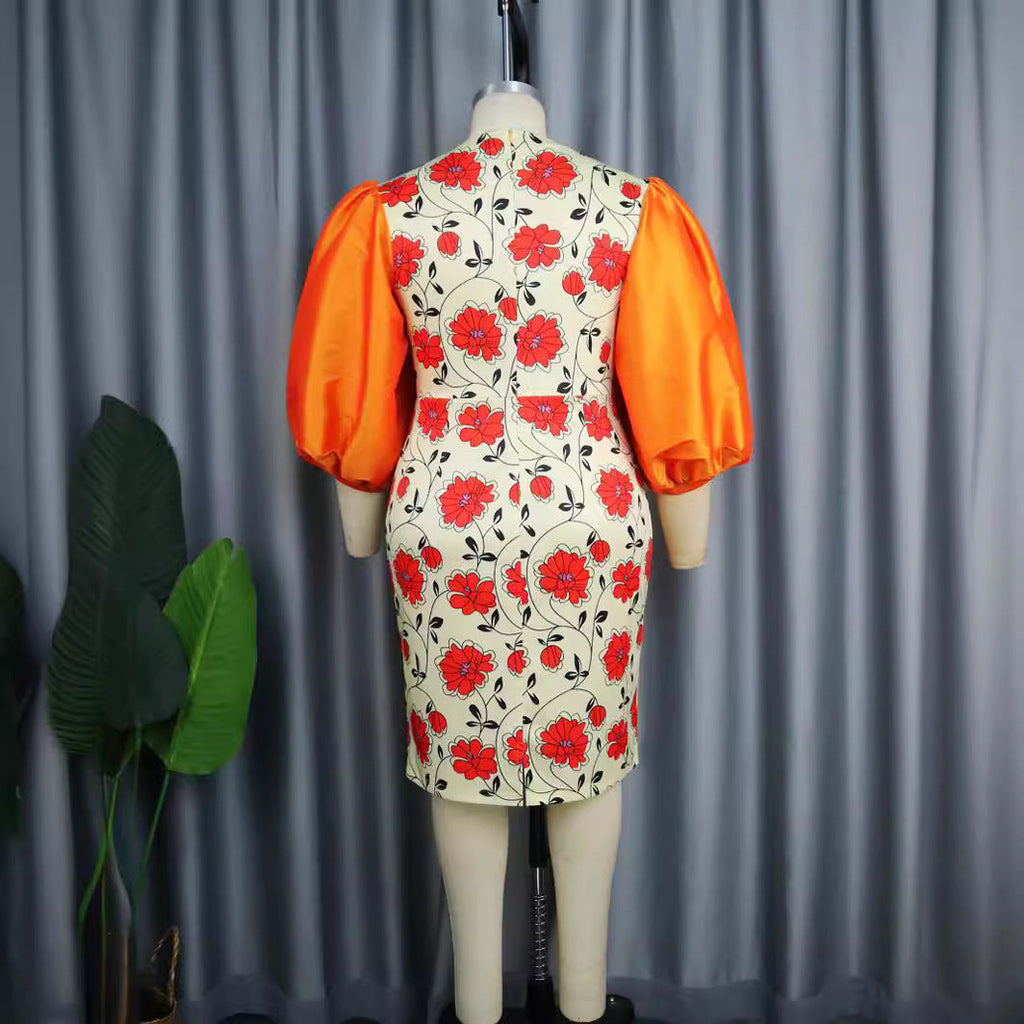 Robe ajustée pour femmes avec des manches bouffantes volumineuses et un motif floral Mirla