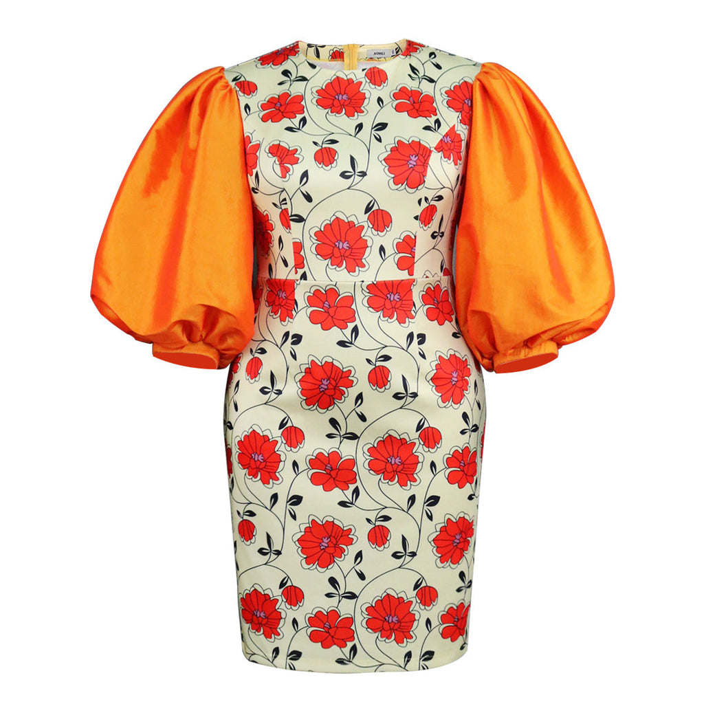 Robe ajustée pour femmes avec des manches bouffantes volumineuses et un motif floral Mirla
