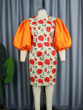 Robe ajustée pour femmes avec des manches bouffantes volumineuses et un motif floral Mirla