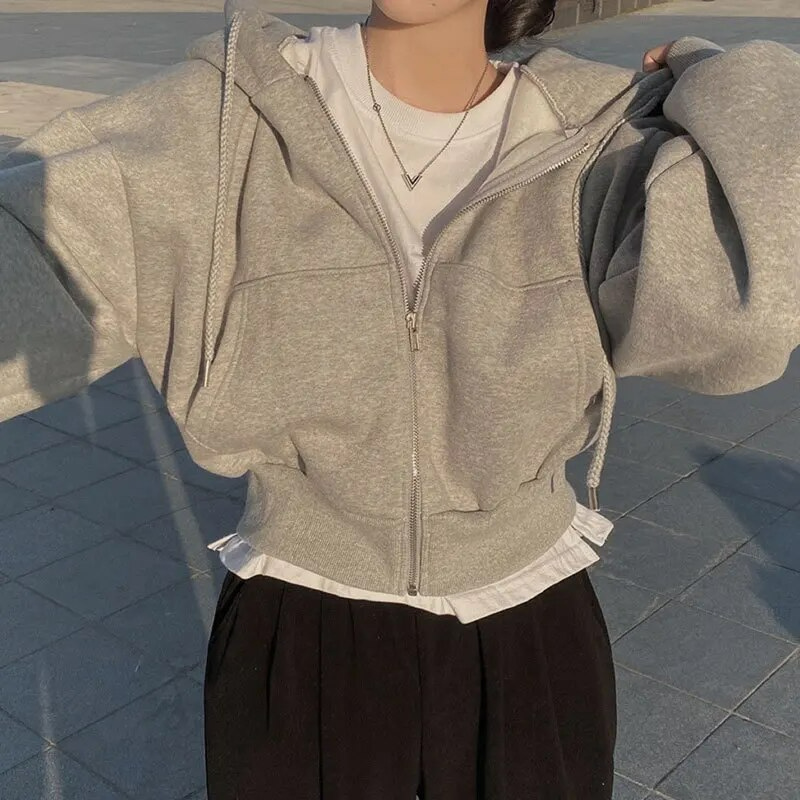 Veste à capuche oversized pour femmes avec fermeture éclair et poches