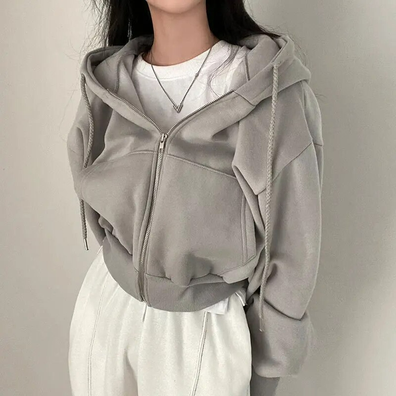 Veste à capuche oversized pour femmes avec fermeture éclair et poches