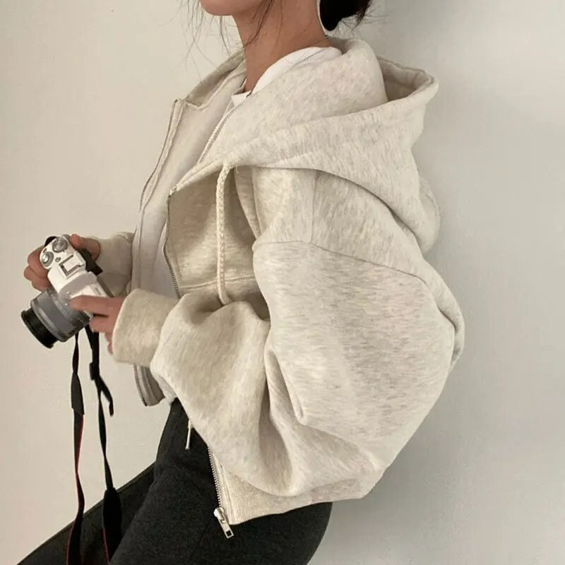 Veste à capuche oversized pour femmes avec fermeture éclair et poches