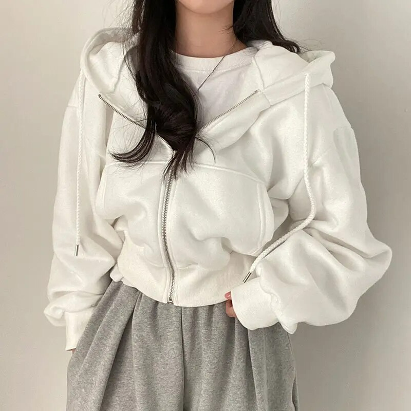 Veste à capuche oversized pour femmes avec fermeture éclair et poches