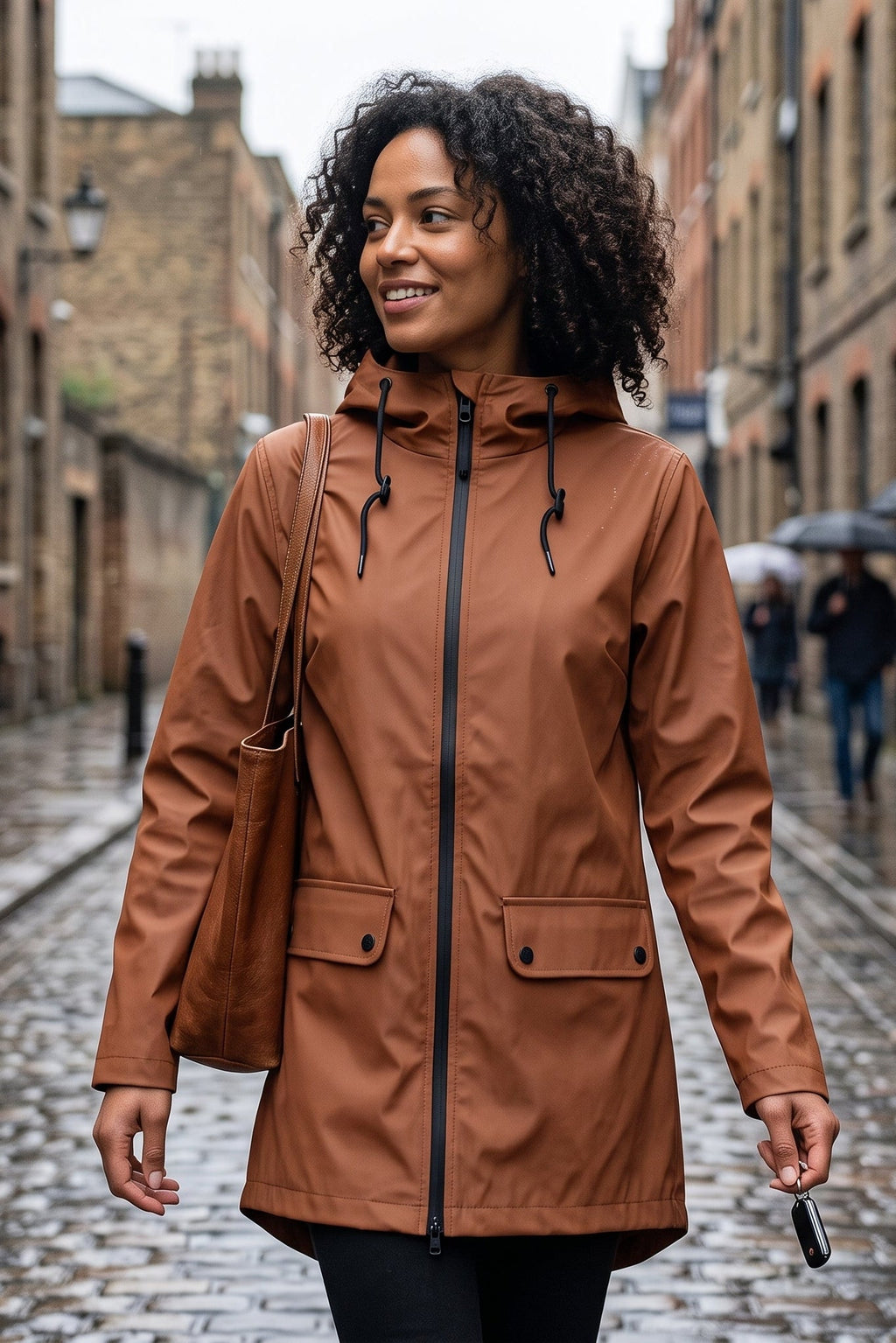 Manteau utilitaire à capuche et fermeture éclair longue
