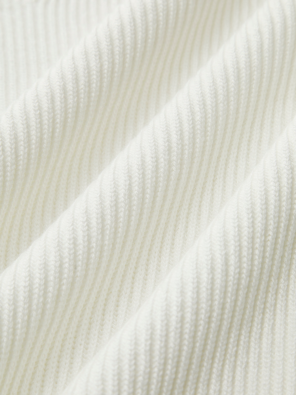 Joella | Haut en tricot à manches longues avec ourlet pointu et décolleté en cœur pour femmes