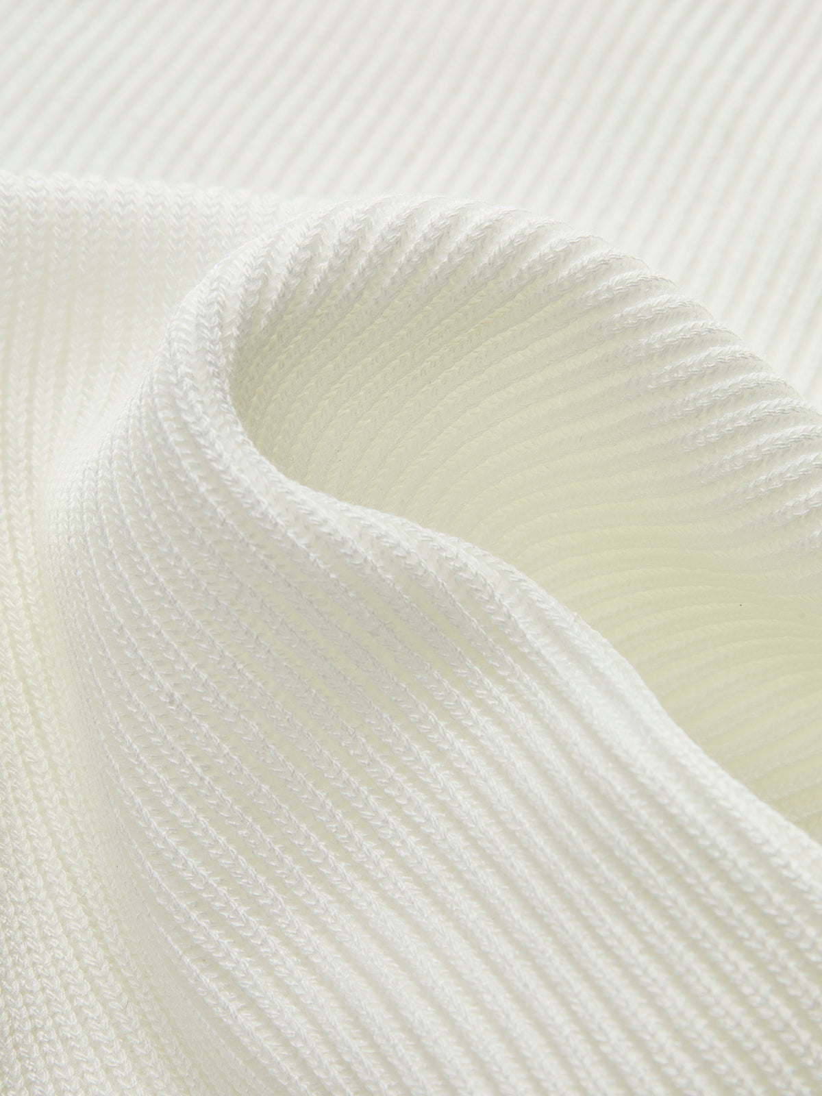 Joella | Haut en tricot à manches longues avec ourlet pointu et décolleté en cœur pour femmes