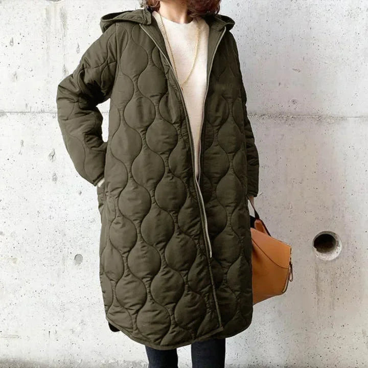 Veste matelassée pour femme avec coupe longue, capuche et fermeture éclair