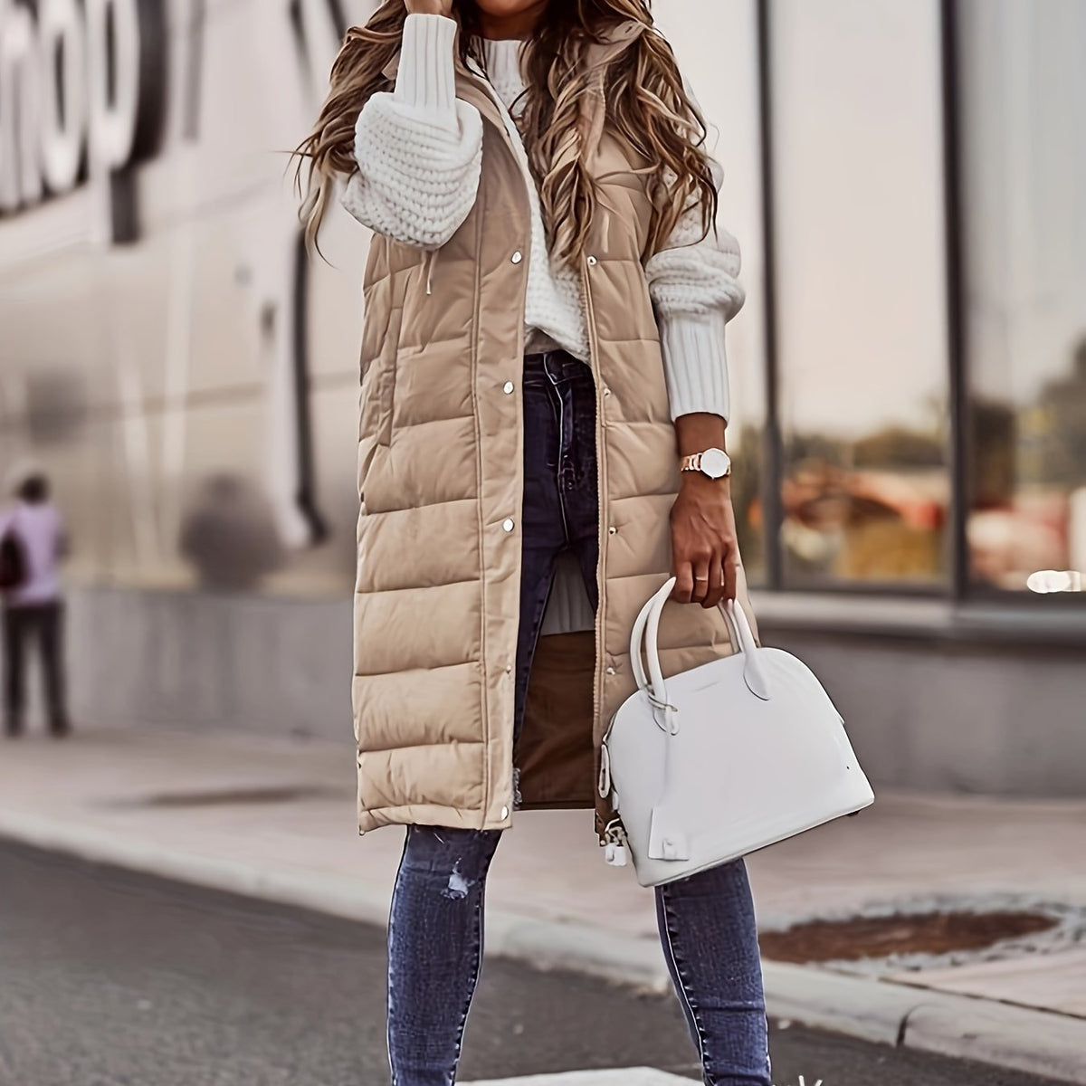 Veste en duvet élégante pour femme avec capuche et pressions