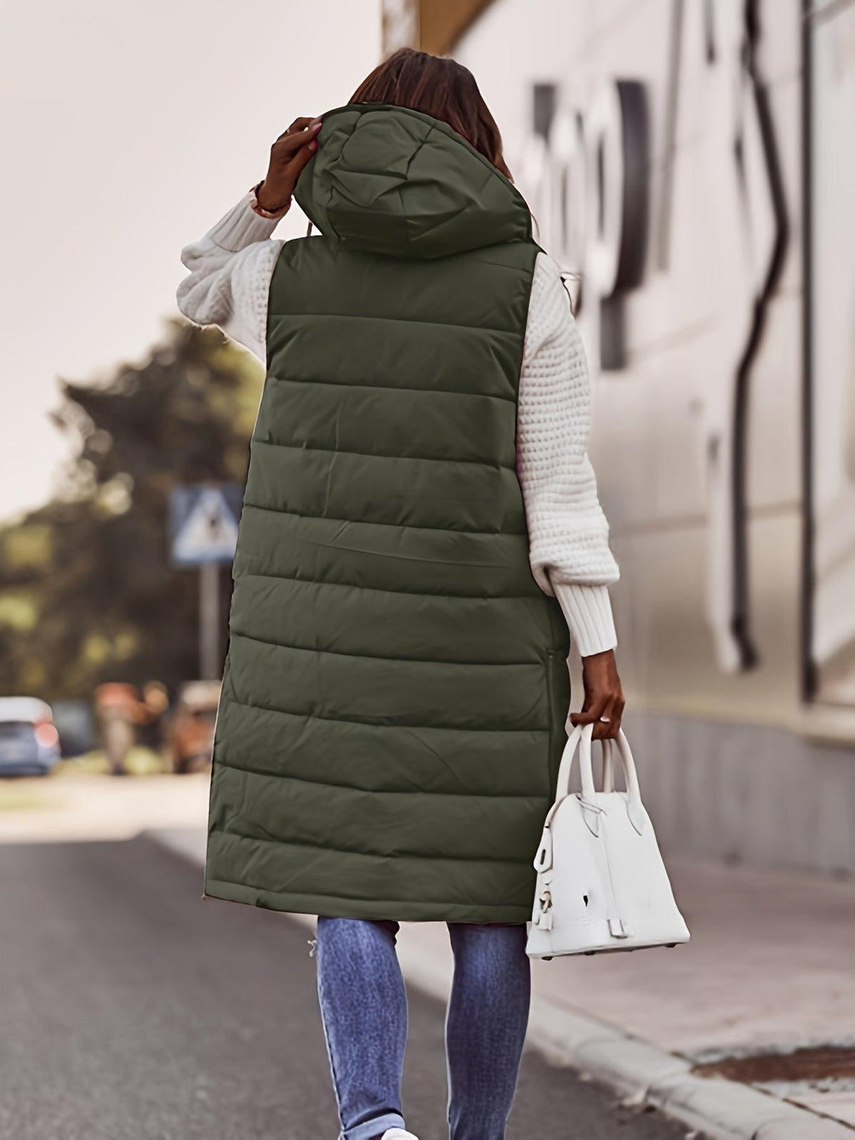 Veste en duvet élégante pour femme avec capuche et pressions