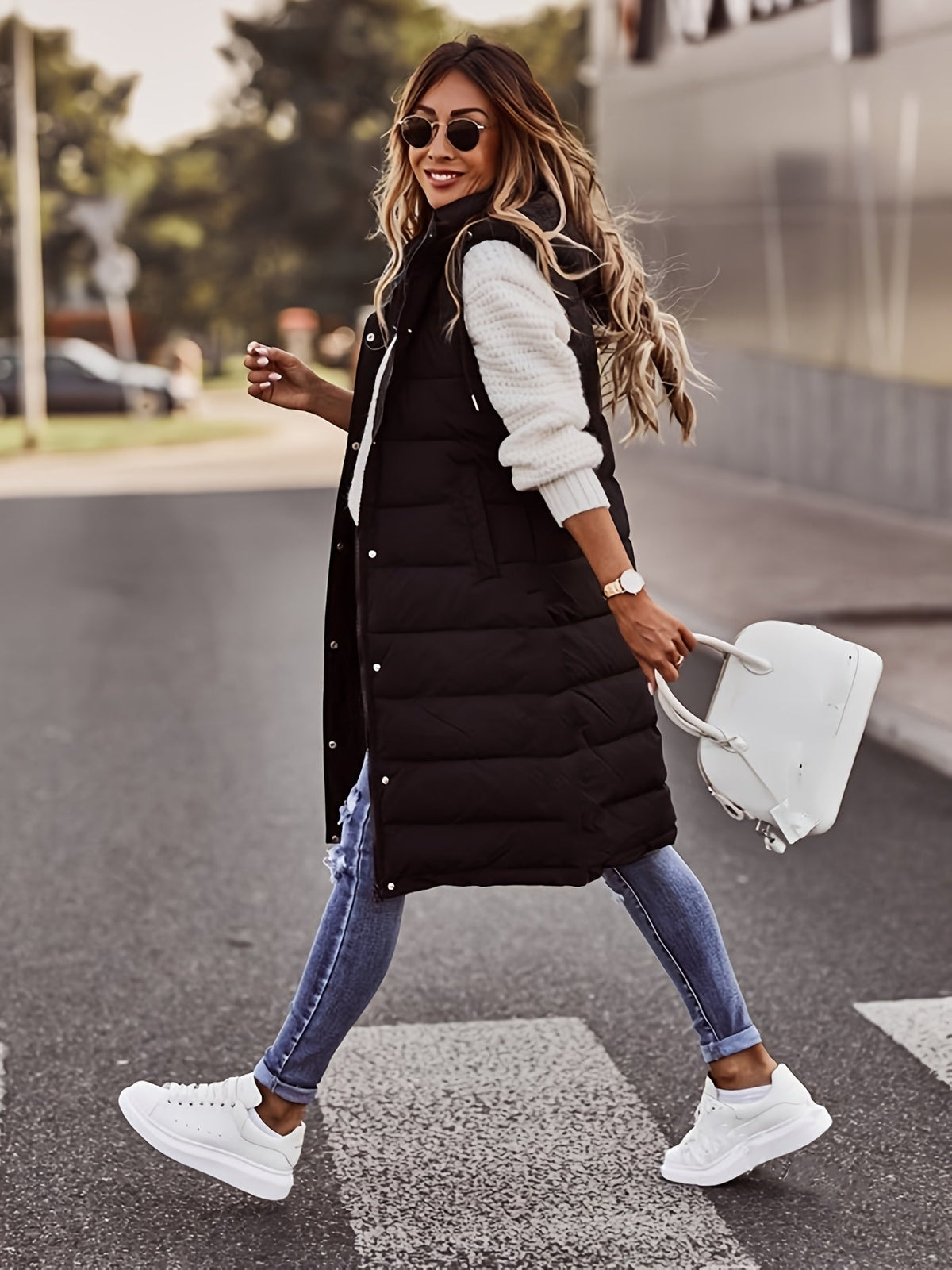 Veste en duvet élégante pour femme avec capuche et pressions