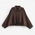 Veste courte élégante pour femme avec coupe ample et boutons