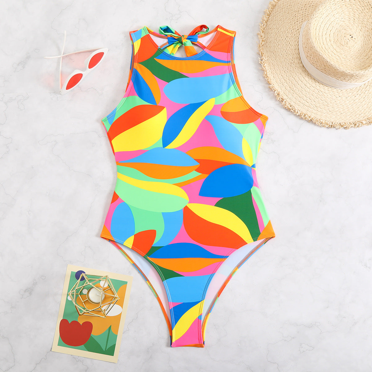 Maillot de bain une pièce sportif pour femmes avec motif de feuilles colorées Drune