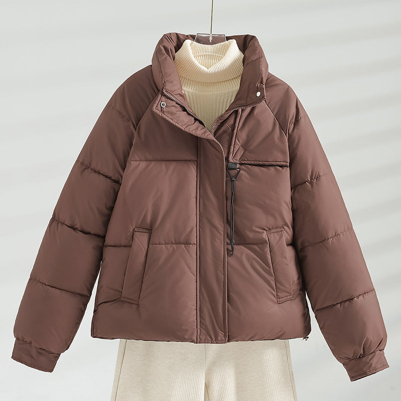 Veste courte matelassée Boxy pour femmes avec col montant, cordon de serrage à la poitrine et poches à rabat obliques Echo Archiv