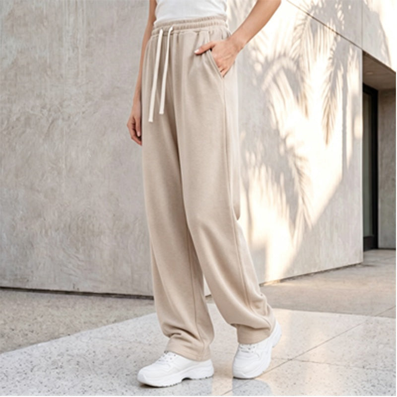 Pantalon palazzo lounge pour femmes avec taille confortable, cordon de serrage, poches latérales et couture décorative Echo Archiv