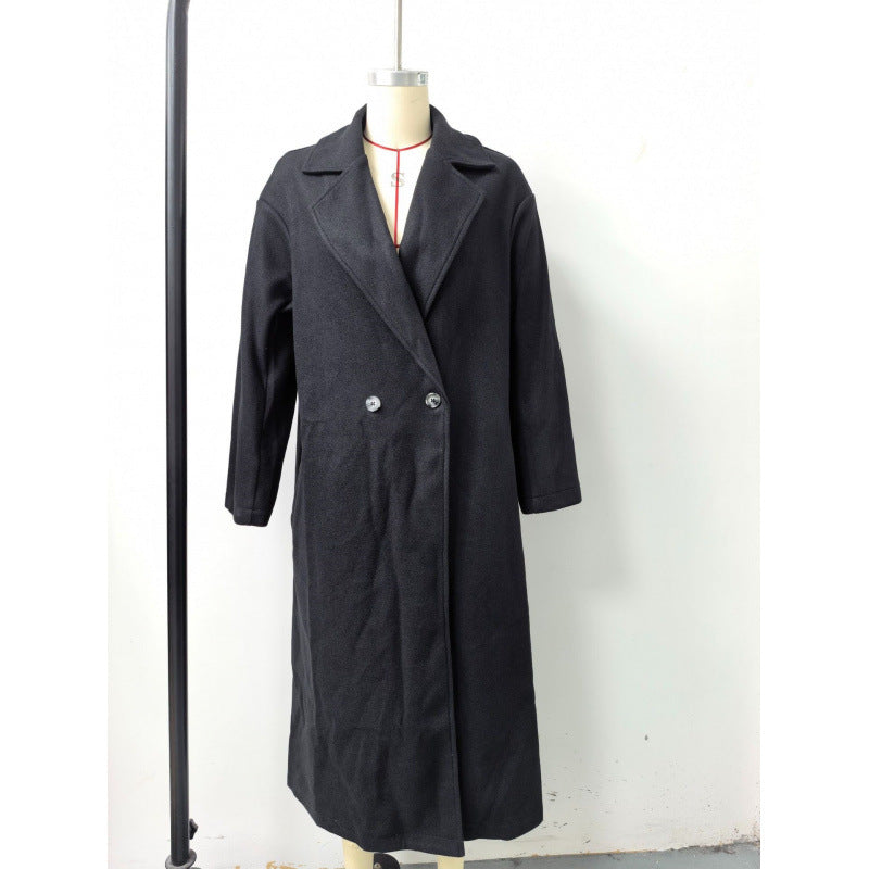 Manteau oversized en mélange de laine pour femmes avec double rangée de boutons, grand col à revers et poches passepoilées Echoarchiv