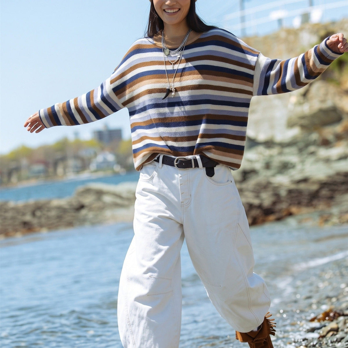 Pull en tricot rayé pour femmes avec col polo et patte de boutonnage Echoarchiv