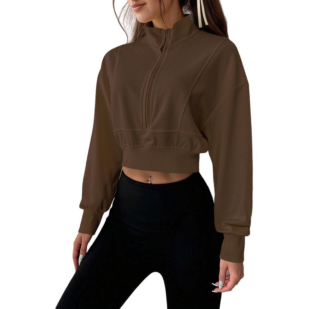 Sweat-shirt court à col montant pour femmes avec demi-fermeture éclair, taille cintrée et manches avec trou pour le pouce