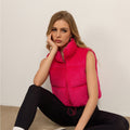Gilet boxy en corduroy matelassé pour femmes avec col montant volumineux et cordon de serrage ajustable Echo Archiv