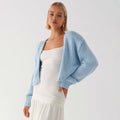 Cardigan oversized en grosse maille pour femmes avec col châle et bords côtelés Echoarchiv
