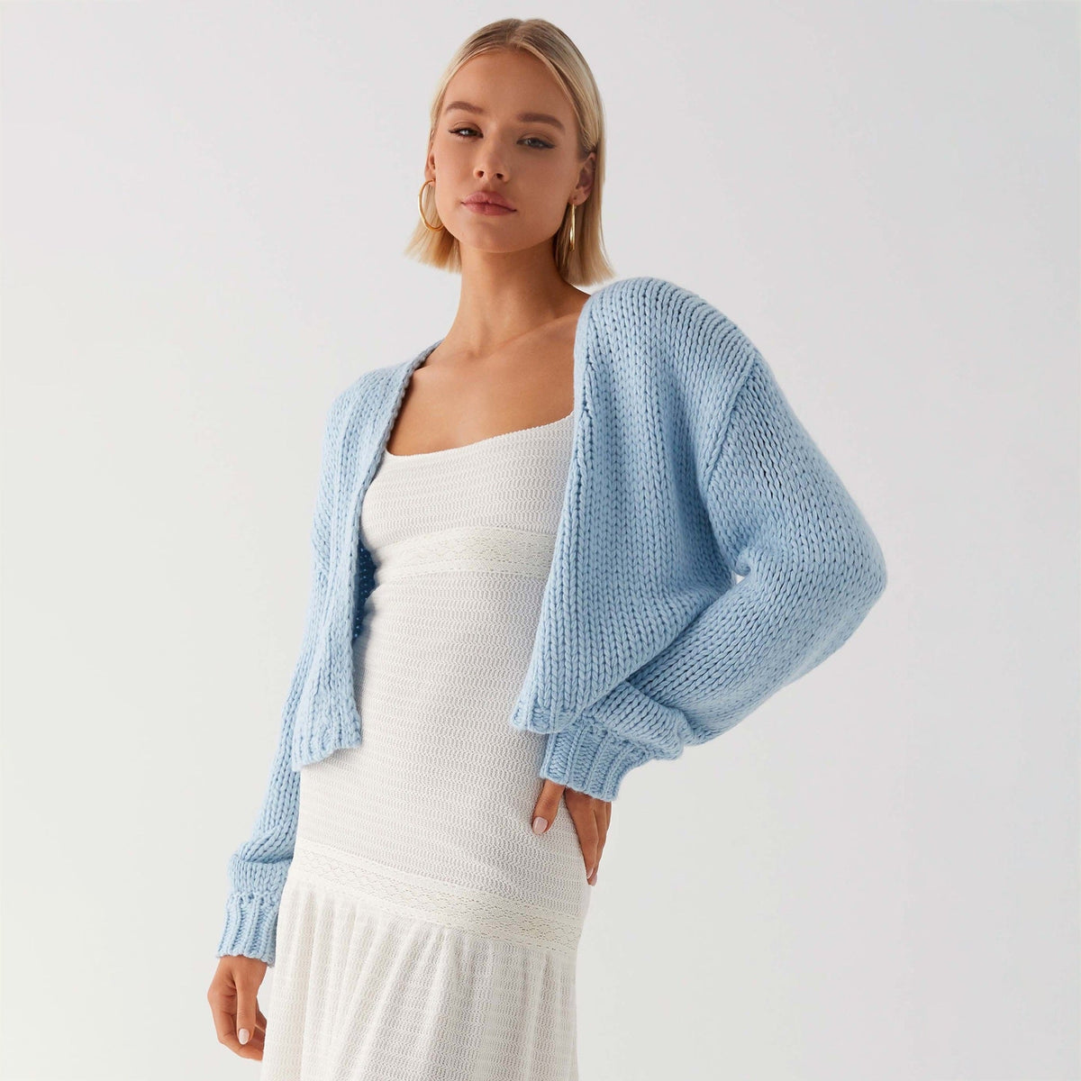 Cardigan oversized en grosse maille pour femmes avec col châle et bords côtelés Echoarchiv