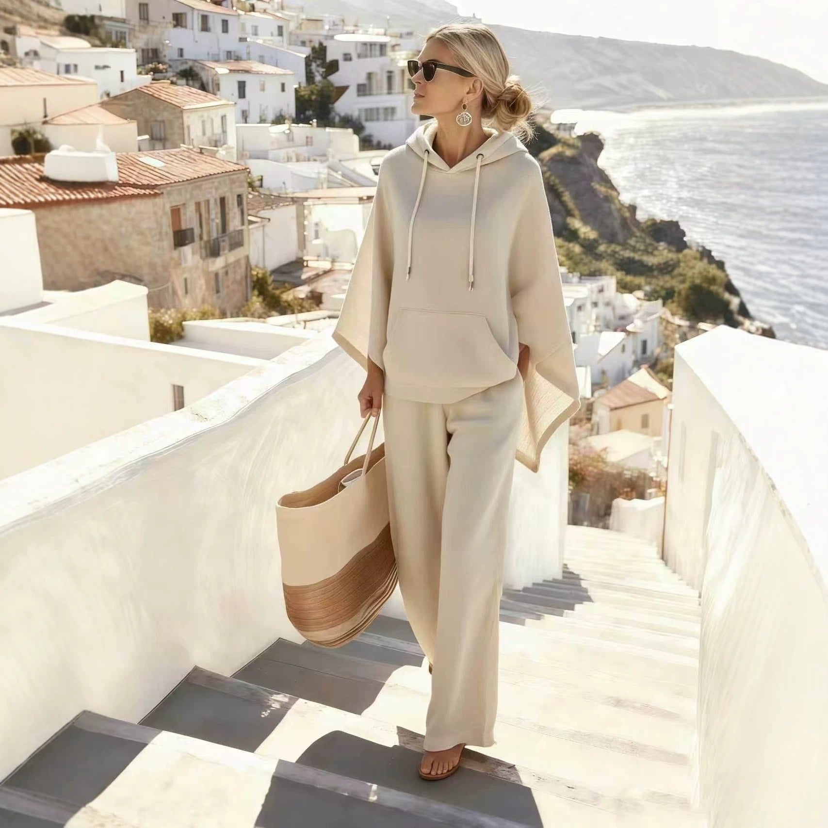 Ensemble lounge pour femmes avec poncho à capuche décontracté et pantalon ample en tissu éponge Echo Archiv