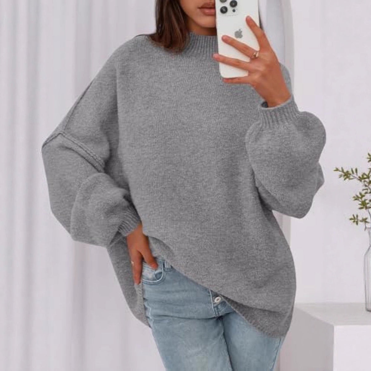 Pull en maille oversize pour femmes avec col montant et manches ballon