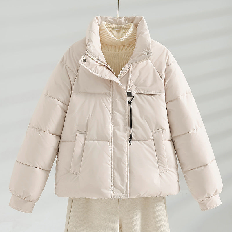 Veste courte matelassée Boxy pour femmes avec col montant, cordon de serrage à la poitrine et poches à rabat obliques Echo Archiv