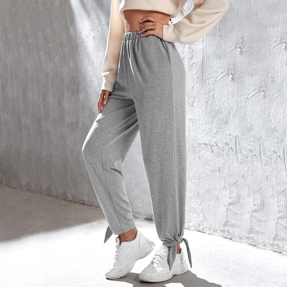 Pantalon de jogging décontracté pour femmes avec taille élastique haute, poches latérales et lien à la cheville